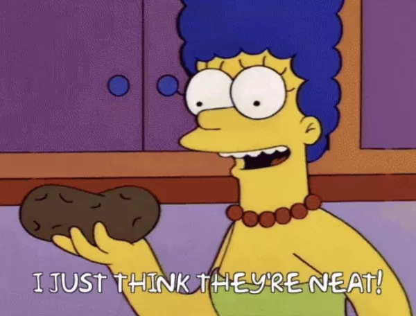 depicts Marge Simpson from the Simpsons holding a potatoe saying 'I just think they're neat